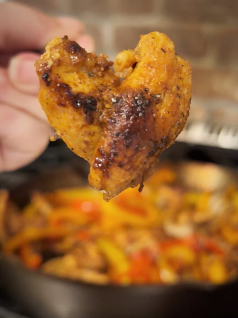 Cast iron chicken fajitas with peppers and onions made with homemade fajita seasoning